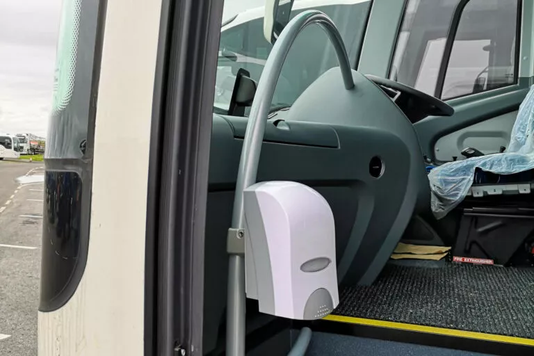 Hand santiser dispenser on Plaxton coach